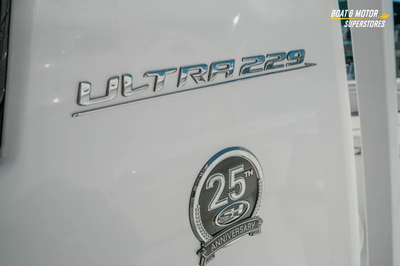 Slide: The Image of 2021 Sea Hunt Ultra 229 boat with 25th anniversary emblem. - 19