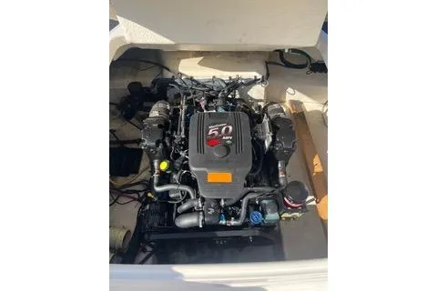 Slide: The Image of 2008 Chaparral Sunesta 224 boat engine, featuring a 5.0 MPI motor in the engine compartment. - 17