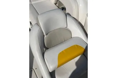 Slide: The Image of 2008 Chaparral Sunesta 224 boat seat with white and yellow upholstery. - 6