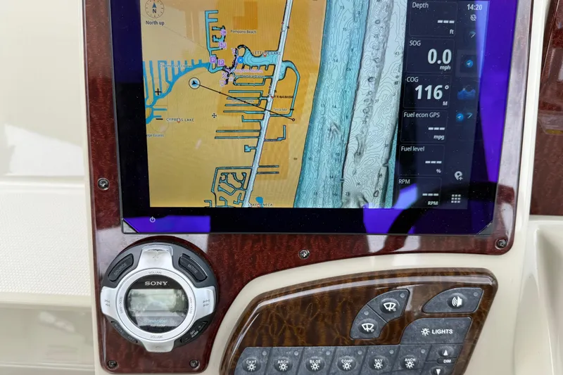 Slide: The Image of Navigation display on a 2012 Sea Ray Sundancer 350 boat dashboard. - 48