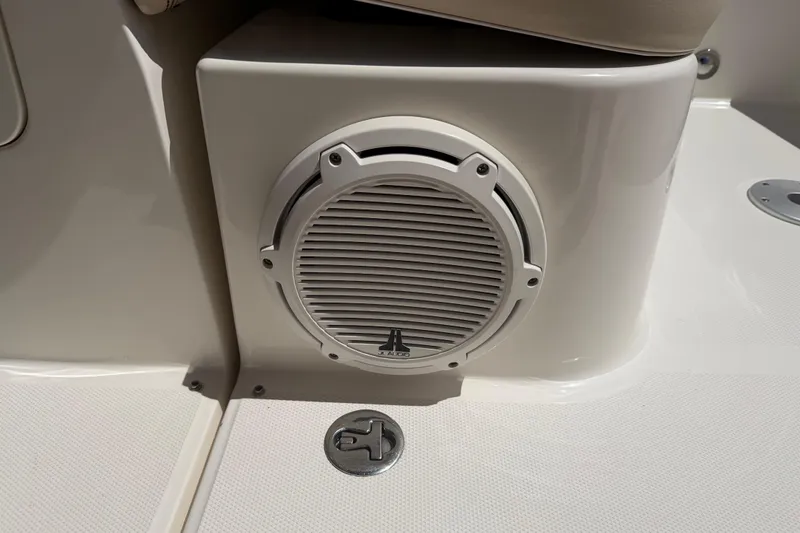 Slide: The Image of Speaker on 2012 Sea Ray Sundancer 350 boat, featuring sleek white design. - 6