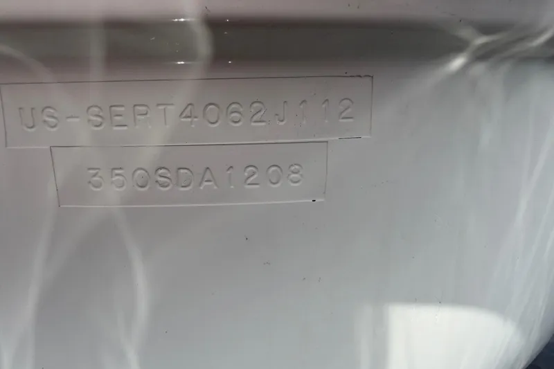 Slide: The Image of Hull identification number on 2012 Sea Ray Sundancer 350 boat. - 65