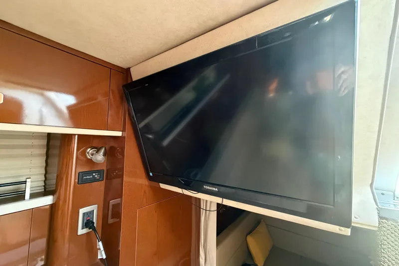 Slide: The Image of Flat-screen TV in 2012 Sea Ray Sundancer 350 cabin interior. - 7