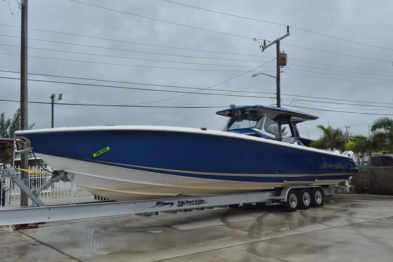 The Image of 2020 Nor-Tech 450 Sport Center Console boat on trailer, blue hull, for sale. - 0