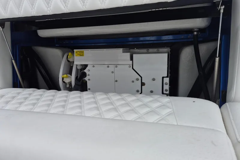 Slide: The Image of Control panel of 2020 Nor-Tech 450 Sport Center Console boat with switches and gauges. - 14