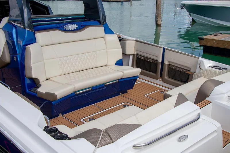 Slide: The Image of Manufacturer Provided Image: 2020 Nor-Tech 450 Sport Center Console helm with dual touchscreen displays and modern controls. - 21