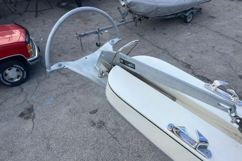 Slide: The Image of Bow of 1998 Albin 28 Tournament Express with anchor and cleats visible. - 26