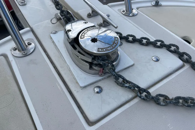 Slide: The Image of Anchor windlass on 1998 Albin 28 Tournament Express boat deck. - 27