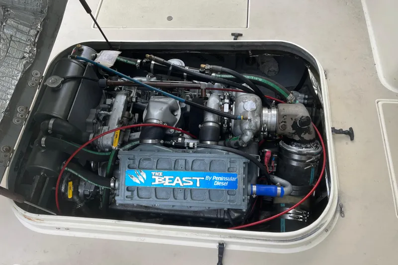 Slide: The Image of Engine compartment of a 1998 Albin 28 Tournament Express with Peninsular Diesel engine. - 31