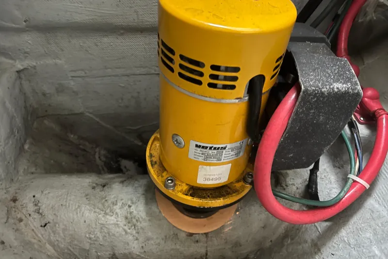 Slide: The Image of Yellow motor component in a 1998 Albin 28 Tournament Express boat. - 32