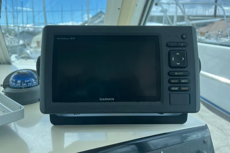 Slide: The Image of Garmin echomap DV on 1998 Albin 28 Tournament Express boat dashboard. - 8