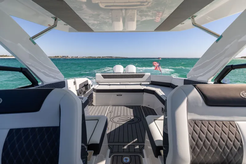 Slide: The Image of Interior view of 2024 Cobalt R35 boat on open water. - 16