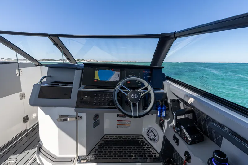 Slide: The Image of Cockpit of 2024 Cobalt R35 boat with modern navigation system. - 23