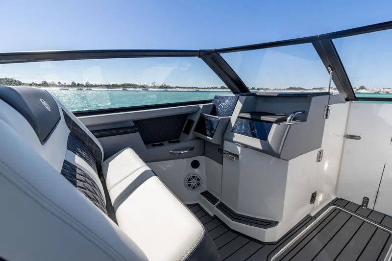 Slide: The Image of Interior of 2024 Cobalt R35 boat with modern cockpit design. - 25