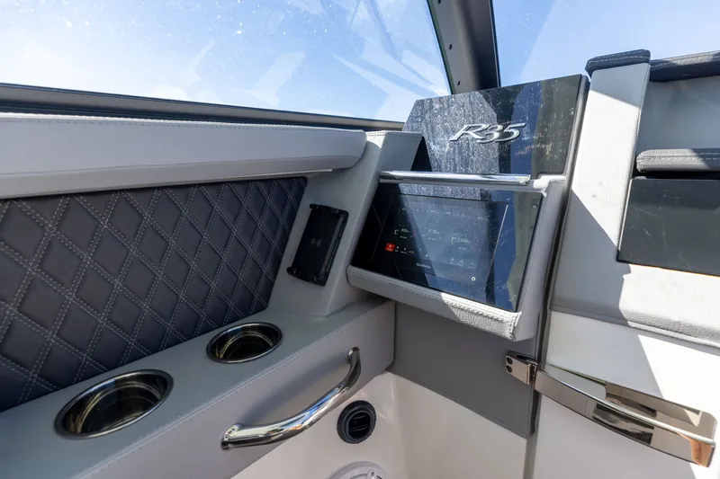 Slide: The Image of Interior of 2024 Cobalt R35 featuring modern design and technology. - 34