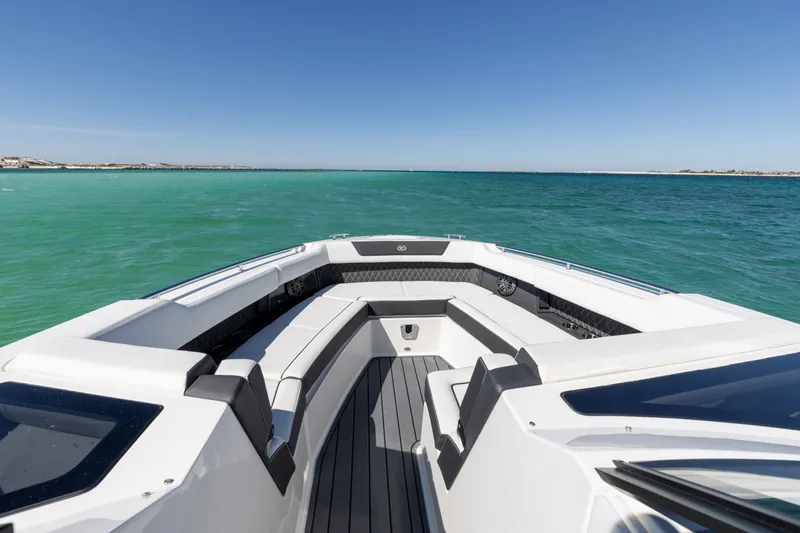 Slide: The Image of 2024 Cobalt R35 boat on open sea, luxurious deck. - 37