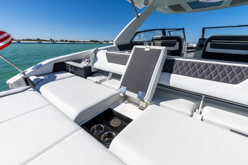 Slide: The Image of Luxurious interior of 2024 Cobalt R35 boat on open water. - 45