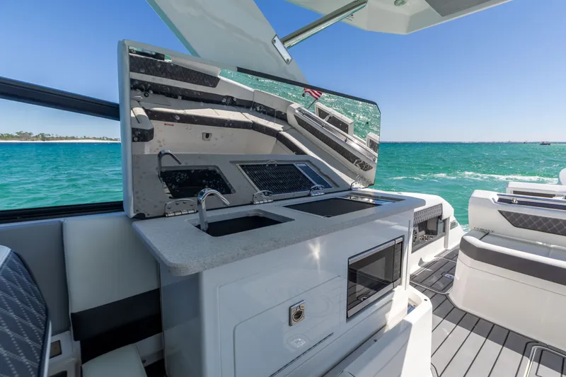 Slide: The Image of Luxurious Cobalt R35 yacht kitchen with ocean view, 2024 model. - 47