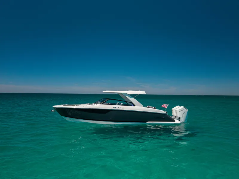 Slide: The Image of 2024 Cobalt R35 boat on clear turquoise water. - 6
