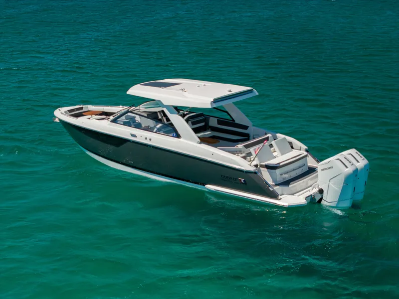 Slide: The Image of 2024 Cobalt R35 boat on turquoise water. - 7