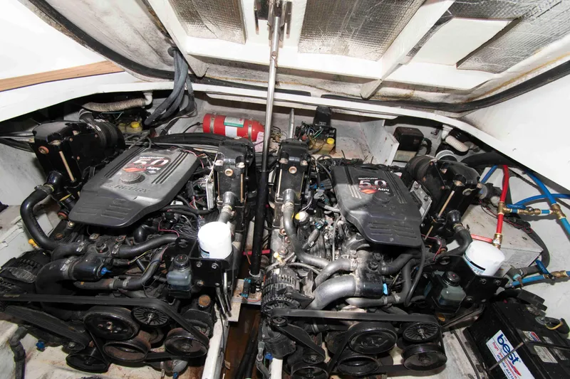 Slide: The Image of Engine compartment of a 2007 Sea Ray 290 Sundancer with twin MerCruiser 5.0 MPI engines. - 15