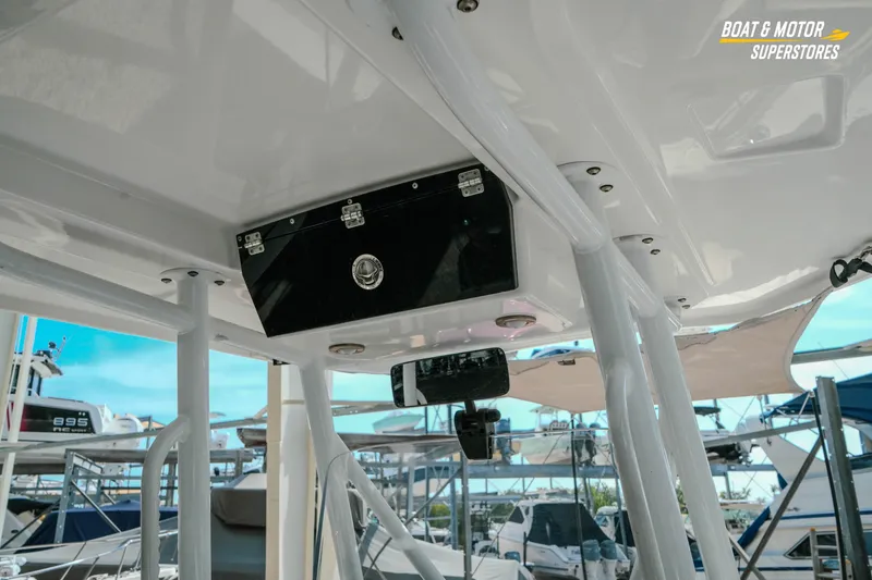 Slide: The Image of 2022 Blackfin 222 CC boat interior with storage compartment and support structures. - 19