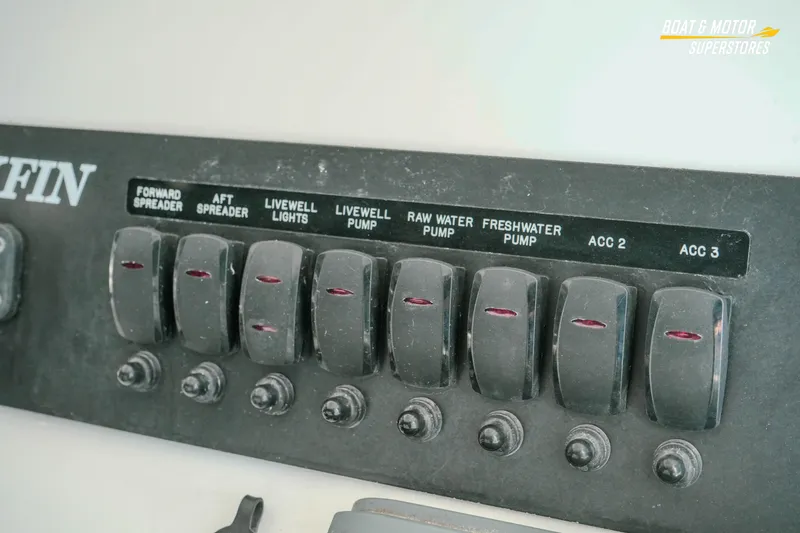 Slide: The Image of Control panel of 2022 Blackfin 222 CC boat with labeled switches. - 21