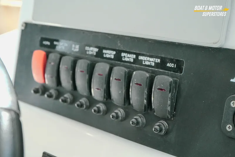 Slide: The Image of Control panel of a 2022 Blackfin 222 CC boat with labeled switches. - 22