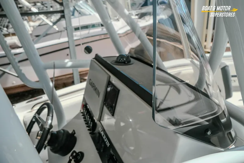 Slide: The Image of 2022 Blackfin 222 CC boat dashboard with Garmin navigation system. - 26