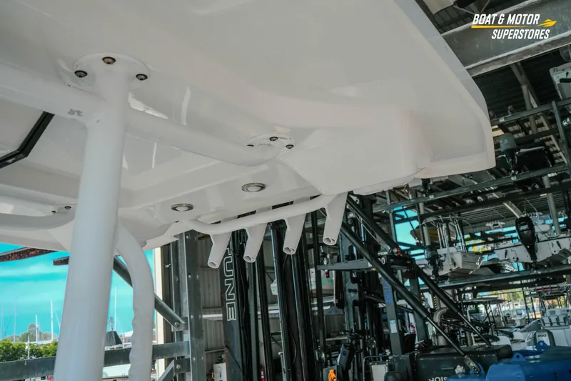 Slide: The Image of 2022 Blackfin 222 CC boat underside view in marina storage facility. - 38