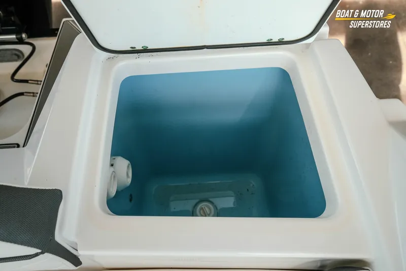 Slide: The Image of Open storage compartment on 2022 Blackfin 222 CC boat. - 43