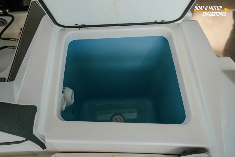 Slide: The Image of Livewell compartment on a 2022 Blackfin 222 CC boat, open and empty. - 44