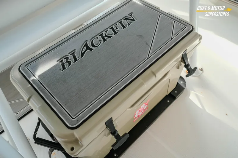 Slide: The Image of Blackfin 222 CC 2022 boat cooler with branded lid, showcased at Boat & Motor Superstores. - 45