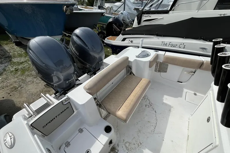 Slide: The Image of 2020 Sportsman Open 252 Center Console boat with dual Yamaha engines. - 13