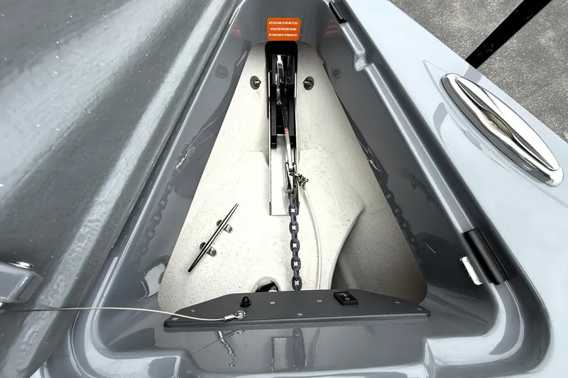 Slide: The Image of 2025 Sunsation 32 CCX anchor compartment with chain and cleat detail. - 14