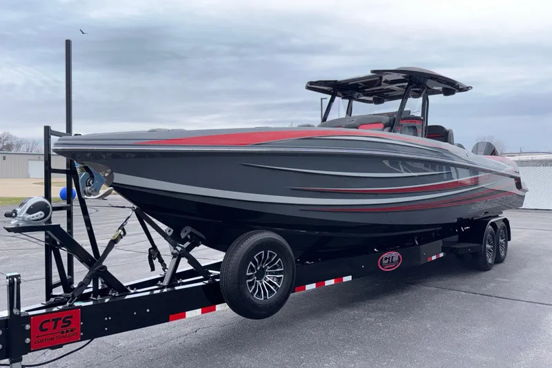Slide: The Image of 2025 Sunsation 32 CCX boat on trailer, featuring sleek design and modern styling. - 2