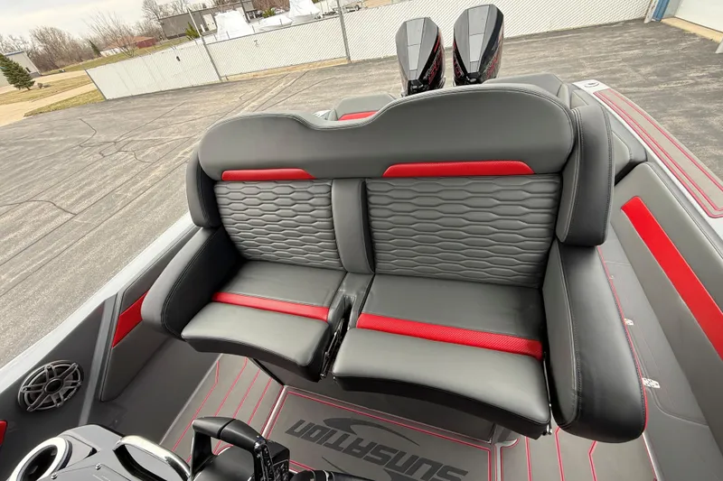 Slide: The Image of 2025 Sunsation 32 CCX boat interior with stylish gray and red seating. - 22