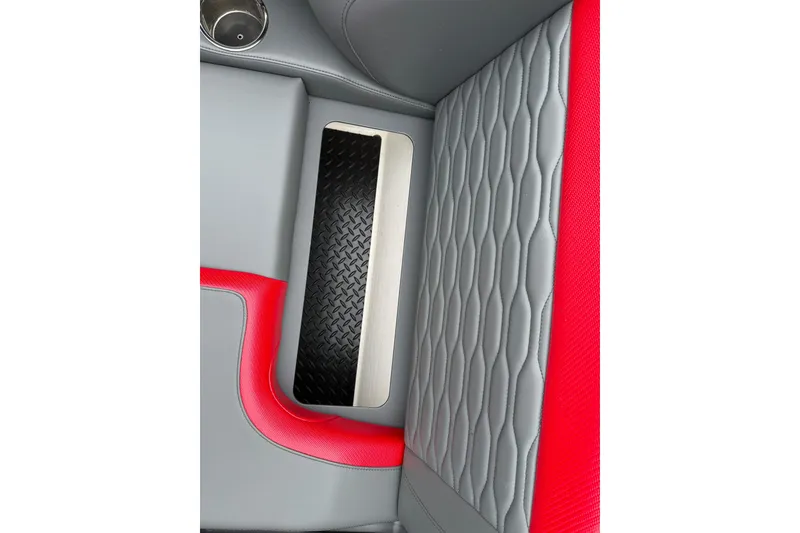 Slide: The Image of Interior of 2025 Sunsation 32 CCX boat with red and gray seating. - 27