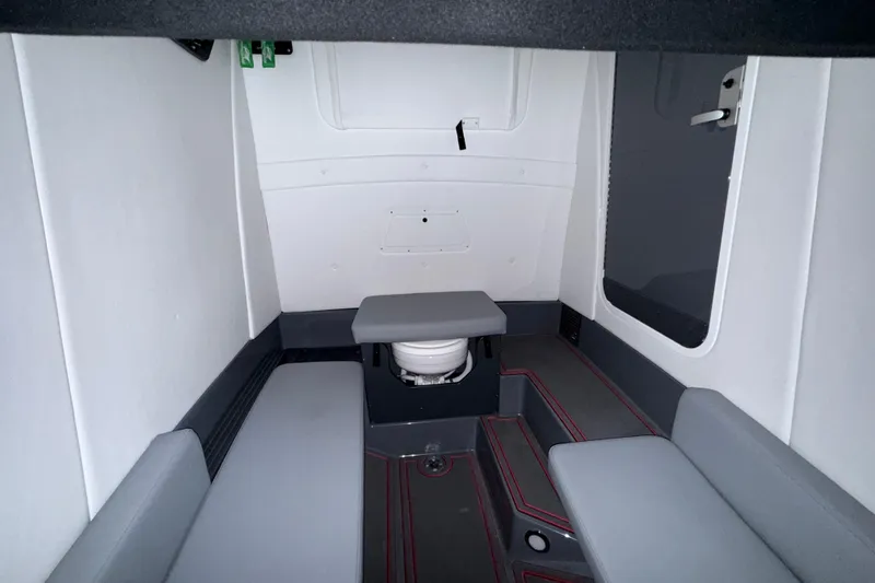 Slide: The Image of Interior cabin of 2025 Sunsation 32 CCX boat, featuring seating and compact design. - 31