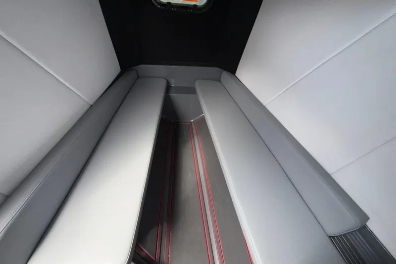 Slide: The Image of Interior cabin of 2025 Sunsation 32 CCX boat with sleek gray seating. - 33