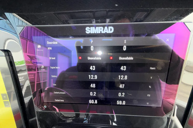 Slide: The Image of Simrad display on 2025 Sunsation 32 CCX showing engine data and diagnostics. - 35