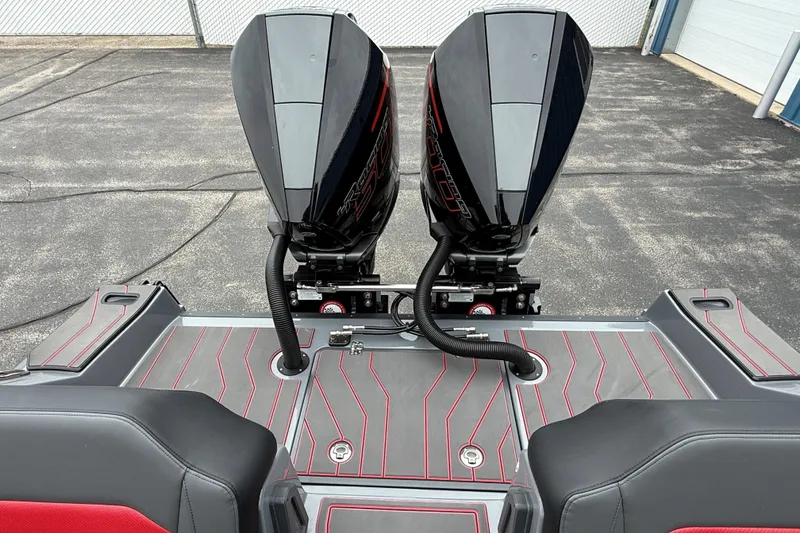 Slide: The Image of 2025 Sunsation 32 CCX boat with dual outboard engines on a sleek deck. - 7