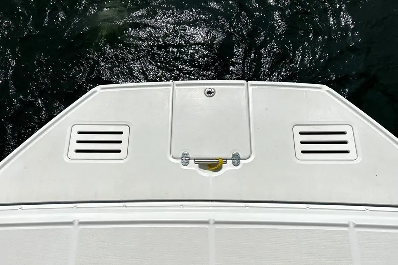 Slide: The Image of 2017 Monterey 360 Sport Coupe boat deck with water reflection. - 18