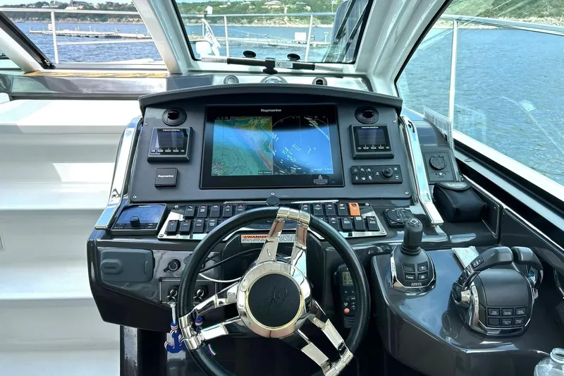 Slide: The Image of Cockpit of 2017 Monterey 360 Sport Coupe with advanced navigation system and controls. - 3