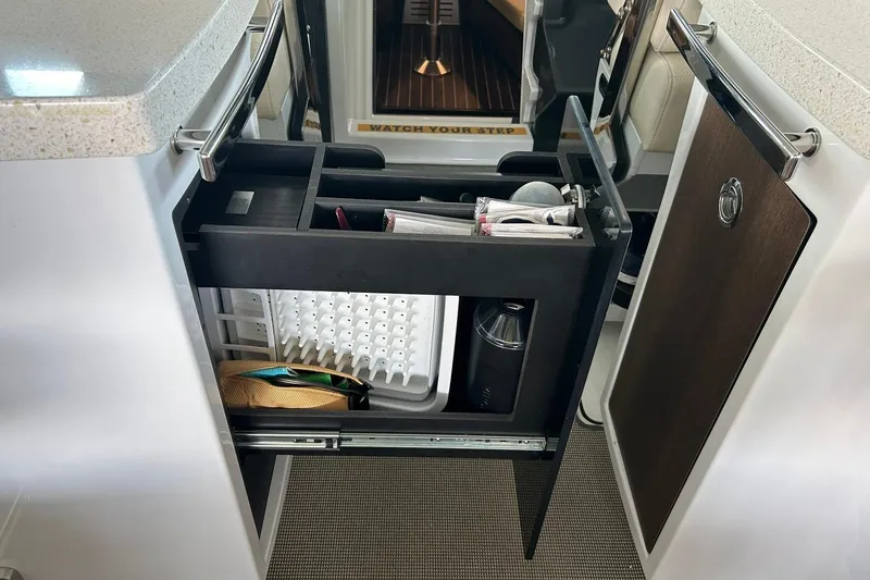 Slide: The Image of Pull-out storage drawer in 2017 Monterey 360 Sport Coupe yacht interior. - 36