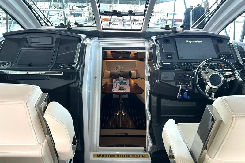 Slide: The Image of Interior view of 2017 Monterey 360 Sport Coupe yacht cockpit and cabin entrance. - 39