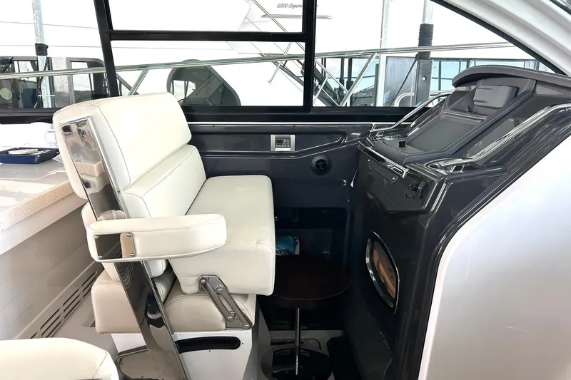 Slide: The Image of Interior of 2017 Monterey 360 Sport Coupe, featuring sleek helm and comfortable seating. - 40