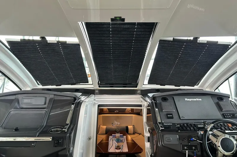 Slide: The Image of Interior view of 2017 Monterey 360 Sport Coupe yacht cockpit with navigation equipment. - 44