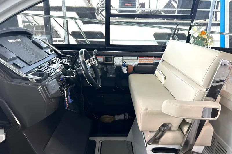 Slide: The Image of Cockpit of 2017 Monterey 360 Sport Coupe with steering wheel and control panel. - 45