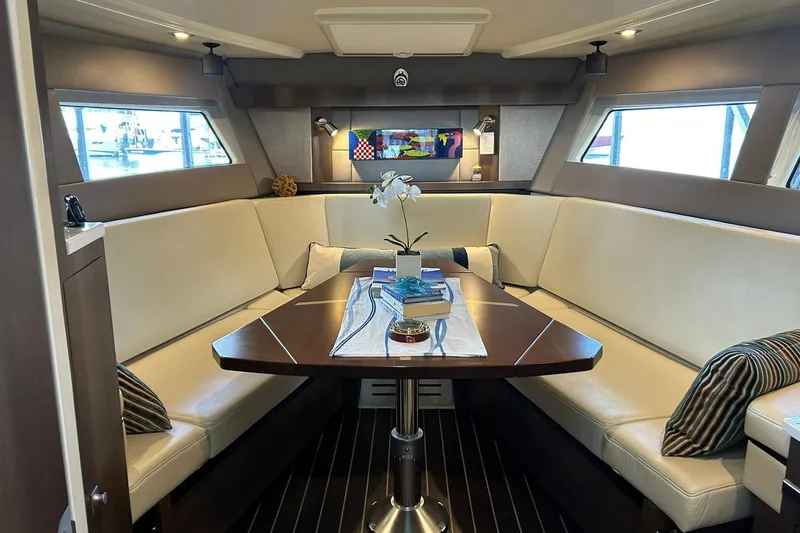 Slide: The Image of Luxurious interior of 2017 Monterey 360 Sport Coupe yacht with elegant seating and decor. - 5